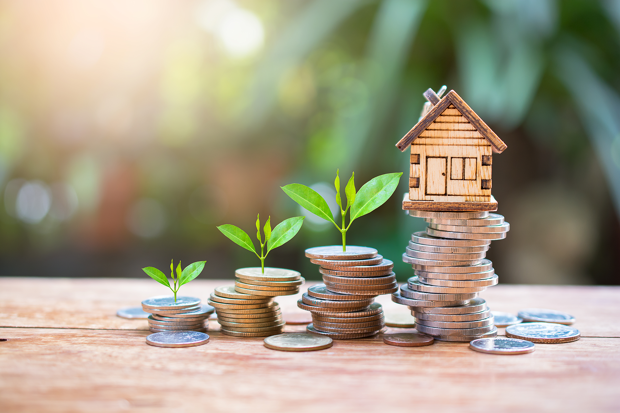 Little house on a stack of coins